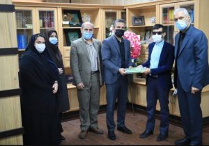 تجلیل سرپرست بهزیستی گیلان از جوان روشندل قرآنی 